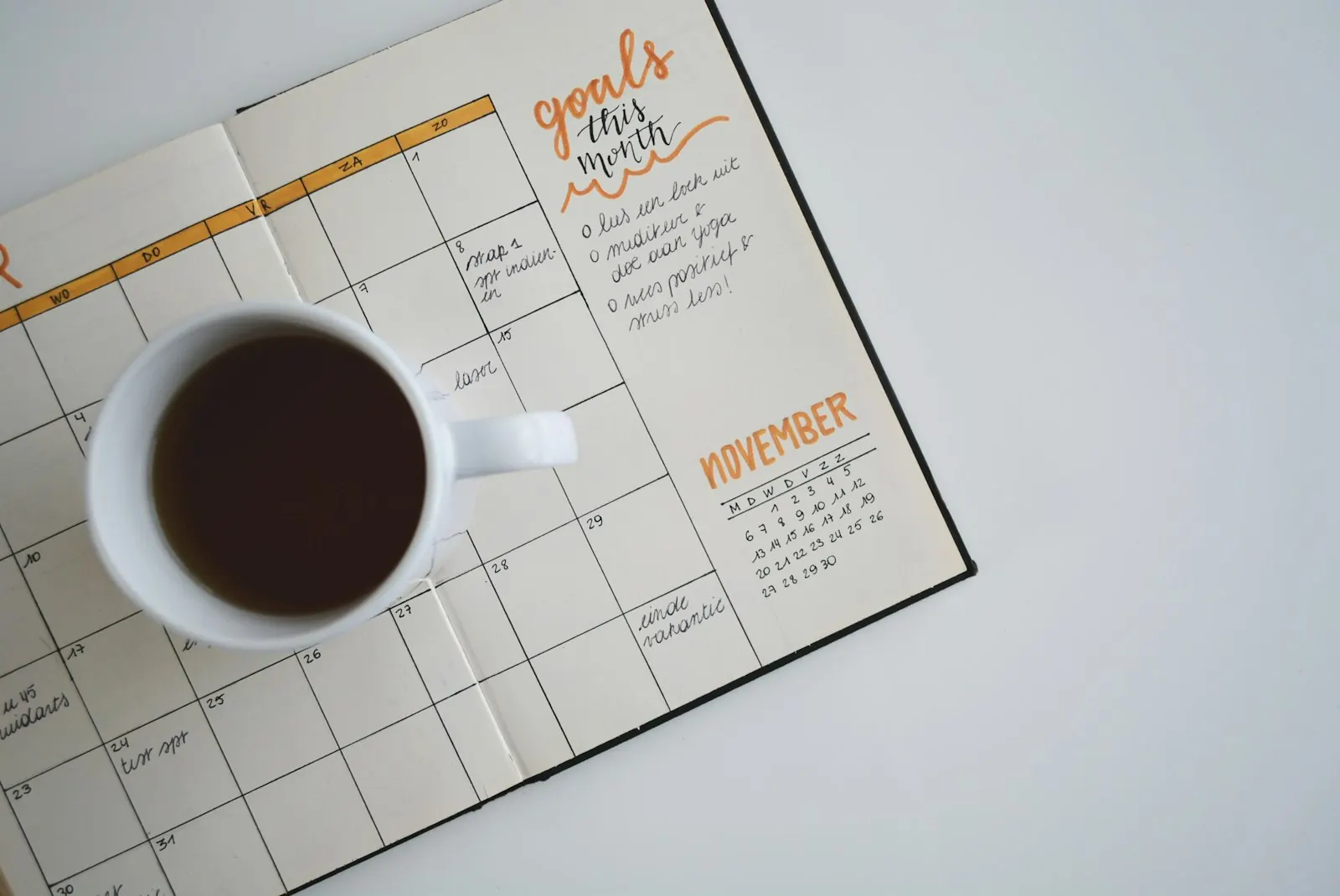 Planner calendar open on a desk representing employee leave planning and scheduling